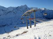 Alpe Alta - 4er Hochgeschwindigkeits-Sesselbahn (kuppelbar) mit Abdeckhauben