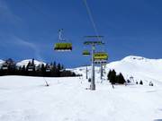 Sattelbahn - 4er Hochgeschwindigkeits-Sesselbahn (kuppelbar) mit Abdeckhauben und Sitzheizung