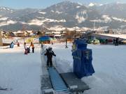 Zauberteppich Stans - Förderband/Zauberteppich