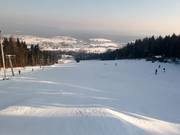 Blick von der Bergstation auf die Piste