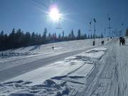 Breite und flache Abfahrt