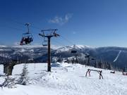 Medvědín - 4er Hochgeschwindigkeits-Sesselbahn (kuppelbar)