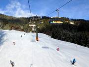 Sunshine Shuttle - 6er Hochgeschwindigkeits-Sesselbahn (kuppelbar) mit Abdeckhauben