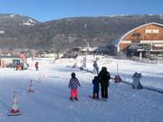 Förderband im Tal in Tröpolach