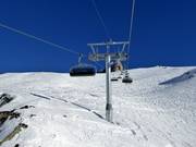 Schneehüenerstock-Flyer - 6er Hochgeschwindigkeits-Sesselbahn (kuppelbar) mit Abdeckhauben