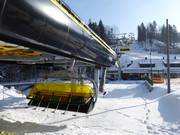 Solisko-Hala Skrzyczeńska - 6er Hochgeschwindigkeits-Sesselbahn (kuppelbar) mit Abdeckhauben und Sitzheizung