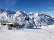 Plattachbahn II - 4er Hochgeschwindigkeits-Sesselbahn (kuppelbar) mit Abdeckhauben