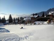 Kostenfreie Schlittenpiste in Villars mit eigenem Förderband