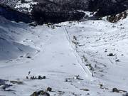Blick auf die Anfängerpiste Sandiger Boden