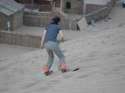 Abfahrt mit dem Snowboard