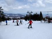 Skikurs an der Bergstation