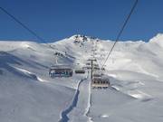 Kringsalmbahn - 6er Hochgeschwindigkeits-Sesselbahn (kuppelbar) mit Abdeckhauben