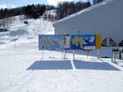 Pistenpläne an der Talstation am Mt. Isola