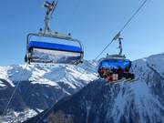 Bendolla-Col du Pouce - 6er Hochgeschwindigkeits-Sesselbahn (kuppelbar) mit Abdeckhauben