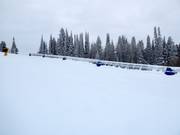 Übungshang mit Förderband an der Bergstation