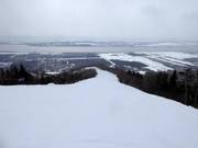 Piste La Crête mit Blick auf den Sankt-Lorenz-Strom mit Île-d'Orléans