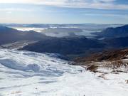 Blick über das Skigebiet Treble Cone bis zur Talstation