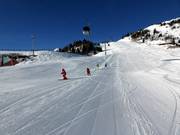 Skikurs oben im Skigebiet
