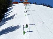 Beschneiung entlang der Pisten